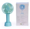 Portable mini rechargeable travel fan for indoor and outdoor use. 
