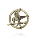 Cross-border hot Hunger games Mockingjay pin pins in stock. 