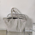 Canvas bag women's ins one-shoulder, large-capacity, lazy wind, striped fashion, big bag, casual literary hand-tote bag women.