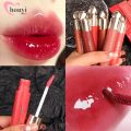 [QIBEST] Mirror Water Light Liquid Lip Gloss / Delicate Smooth Waterproof Non-stick Cup Lipstick / Long Lasting Lipstick / Glass Lip Moisturizing Lip Tint / Lip Makeup Cosmetic. 