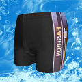 Xigge swim trunks men's boxer beach pants student baggy plus size swim trunks hot spring quick-drying swimming gear. 