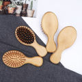 MIni Anti-Static Wood Hair Brush with Extendable Comb Design for Healthy Scalp Care.