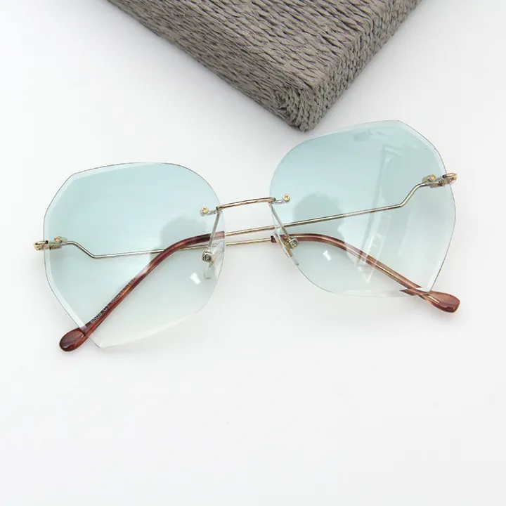Qianai%20new%20fashion%20hipster%20cut%20edge%20sunglasses%20women's%20irregular%20fashion%20rimless%20ocean%20piece%20sunglasses%20driving%20mirrors%20-%20Image%207