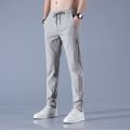 Men's Ice Silk Trousers Solid Color Mid Waist Loose Breathable Straight Casual Pants Thin Quick Dry Sports Pants.