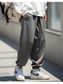 New Design Drawstring Harem Pants Men Baggy Jogging Pants Japanese Style Male Crotch Wide Leg Pants Casual Loose Trousers. 