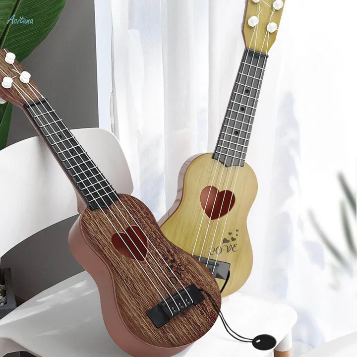 Kids%20Ukulele%20Guitar%20Toy%20Boys%20Brown%2038x12.5cm%20Brown%20-%20Image%208