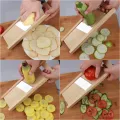 Potato slicer: Slice lotus root slices, potato chips gratus, commercial thin slices, lemon grapes, shredded potatoes, shredded vegetables. 