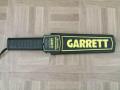 Garrett scanner handheld metal detector. 