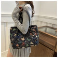 Large capacity one-shoulder handbag  new niche ins canvas bag lazy style tote class commuter bag. 