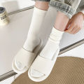 Douyin thin loose white boneless socks confinement socks spring and summer solid color medium socks cotton pile socks.