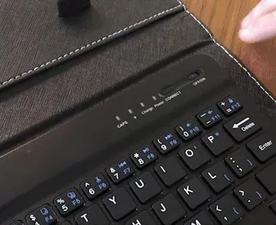 Wireless%20Bluetooth%20Keyboard%20For%20Iphone%20Huawei%20Xiaomi%20Tablet%20Mini%20Keyboard%20Mobile%20Phone%20Gaming%20Keyboard%20PU%20Case%20Support%20-%20Image%205
