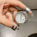 dinimi new rhinestone fashion temperament light luxury quartz watch simple commuter steel band ladies with calendar watch.