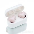 New heartbuds love earphones, heart-shaped headphones, cute girls, wireless bluetooth headphones with colored lights. 