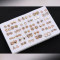 36Pairs Earrings Mixed Styles Rhinestone Sun Flower Geometric Animal Plastic Stud Earrings Set For Women Girls Jewelry. 