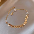 Trendy Fashionable Pearl Leaf Chain Golden Bracelets for Girls Charm Jewelry - Bracelet for Women Simple Fashion New Collection. 