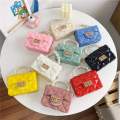 Mini Jelly Handbag with Pearl Handle - PU Leather Crossbody Bag for Women and Girls.