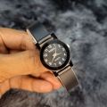 Black Belt New Fashionable stainless analogue Hand watches for women's.
