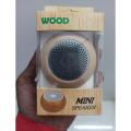 Wood bluetooth mini speaker round shape. 