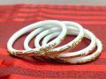 White Shakha Pola Bangles for Women 4 Pcs Plastic. Party , Wedding , Anniversary , Druga Puja & All Time Use Sakha Bangles. Model:CD160.. 