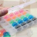 A Box of 25pc Coloured Plastic Bobbins in One Plastic Bobbin Case Box Colorful Plastic Sewing Machine Bobbins AA7242.