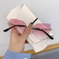 2023 New Ladies Cat Ear Sunglasses Classic Rimless Gradient Sunglasses High Quality Women's Brand Designer Glasses Shadow UV400.