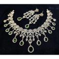 Green color Indian diamond cut Ad stone party wear jewelry necklace set for women.