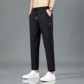 New Men'S Korean Fashion Casual Summer Thin Quick Drying Ice Silk Straight Pants Loose Sports 9-Point Trousers Boy. 