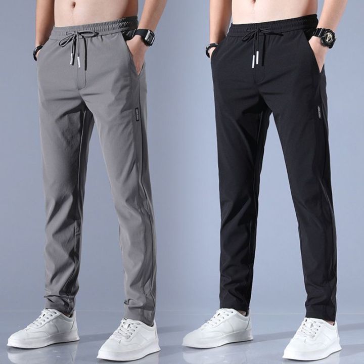 Men's%20Ice%20Silk%20Trousers%20Solid%20Color%20Mid%20Waist%20Loose%20Breathable%20Straight%20Casual%20Pants%20Thin%20Quick%20Dry%20Sports%20Pants%20-%20Image%204