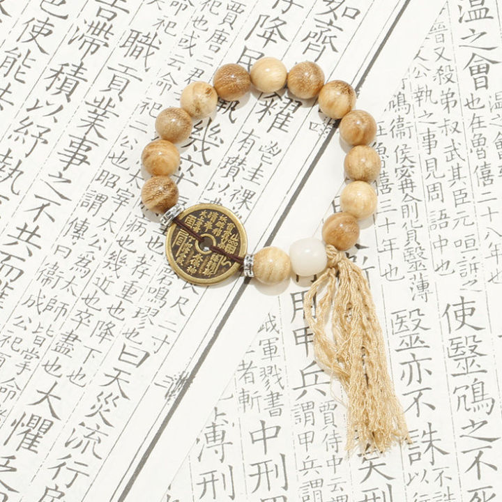 Xiaohongshu%20has%20the%20same%20milky%20wood%20beads,%20mountain%20ghosts,%20spending%20money,%20bracelets,%20retro%20literary%20temperament,%20versatile,%20hand-knitted%20niche%20design%20-%20Image%206