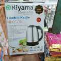 Electric Kettle Model NEK-1216 stainless steel body Osaka Japan technology silver color.