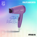 Philips HP8100/46 Compact Hair Dryer – 1000W, ThermoProtect Technology, 2 Heat Settings (Purple). 