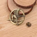 Cross-border hot Hunger games Mockingjay pin pins in stock. 