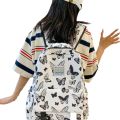 Large capacity Japanese butterfly backpack lightweight nylon cloth upper flap backpack printed high quality junior high school student school bag. 