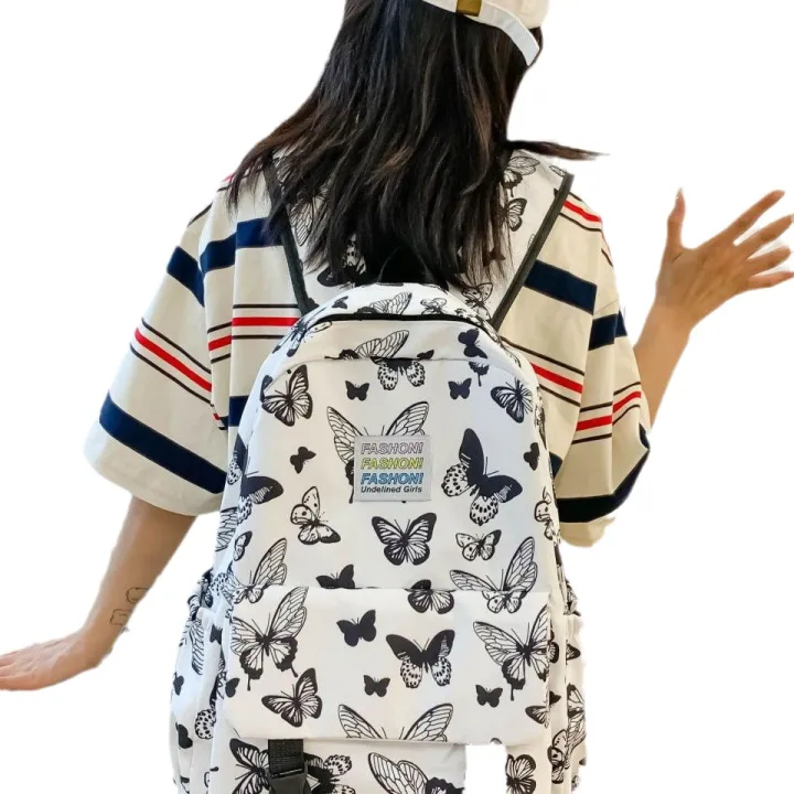 Large%20capacity%20Japanese%20butterfly%20backpack%20lightweight%20nylon%20cloth%20upper%20flap%20backpack%20printed%20high%20quality%20junior%20high%20school%20student%20school%20bag%20-%20Image%205