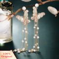 Lady Bling Rhinestone Inlaid Butterfly Long Tassel Faux Pearl Drop Stud Earrings. 