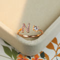 Cross border amazon new rose gold letter white diamond open ring hand ornament men's and women's personality unique ring wholesale. 