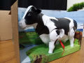 Battery Operated Milk Cow Toy - Multi-color. 