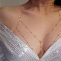 Metal Body Bust Chain Jewelry for Women Style Hollow Bikini Ladies Breast Crystal Body Chain Decoration Fashion Jewelry.