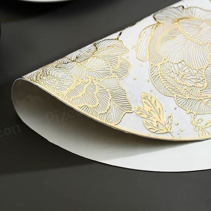 Golden%20Flower%20Placemat%20%7C%20Round%20PVC%20Dining%20Mat%20%7C%20Heat-Resistant%20Table%20Pad%20%7C%20Non-Slip%20Table%20Protector%20%7C%20Washable%20Decorative%20Placemat%20%7C%20Elegant%20Wedding%20Tableware%20%7C%20Festival%20Dining%20Table%20Mat%20%7C%20Luxury%20Gold%20Table%20Decor%20%7C%20%20Model%20PM%201001%20by%20Pizeon%20Luxury%20Linens%20-%20Image%207