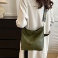 Fashionable and trendy wide strap PU shoulder sling bag high-capacity crossbody bag for women.