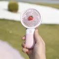 Convenient and ultra-quiet USB mini handheld wind power fan with portable phone holder student office small cooling fans. 