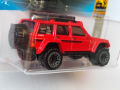 Hot Wheels (Mainline) 95 Jeep Cherokee Red, Scale - 1:64. 