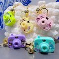 Cartoon Sanrio camera keychain children's toys luminous projection camera car keychain small gifts. 