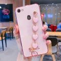 For OPPO F7 Back Cover with Love Heart Chain Wrist Strap Fashion Bracelet Shiny Plating Bumper Protective Case Silicone Shockproof Mobile Phone Cases. 