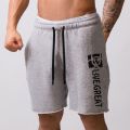 Summer Shorts Men Loose Large Size Breathable Knee Lenght Pants Solid Color Printing Running Shorts Simple Fashion Gym Shorts.