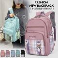 Elementary school bag for girls 4th, 5th and 6th grade nylon cloth plaid backpack Korean version large capacity backpack for junior high school students. 