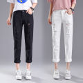 Ripped jeans cropped pants women's black and white loose student light color bf beggar pants spring new harlan 9 point pants.