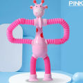 NEW Suction Cup Telescopic Tube Giraffe Toy Kids Versatile Cartoon Puzzle Luminescence LED Decompression Toys Children Birthday Party Gift. 