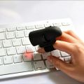 Mini Bluetooth-compatible Wireless Finger Ring Mouse Ergonomic Handheld Optical Travel Mice (2.4G Version). 