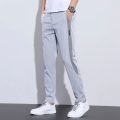 Summer Thin Ice Silk Pants Men's Summer New Korean Style Trendy Sports Casual Pants Straight Loose Long Pants. 